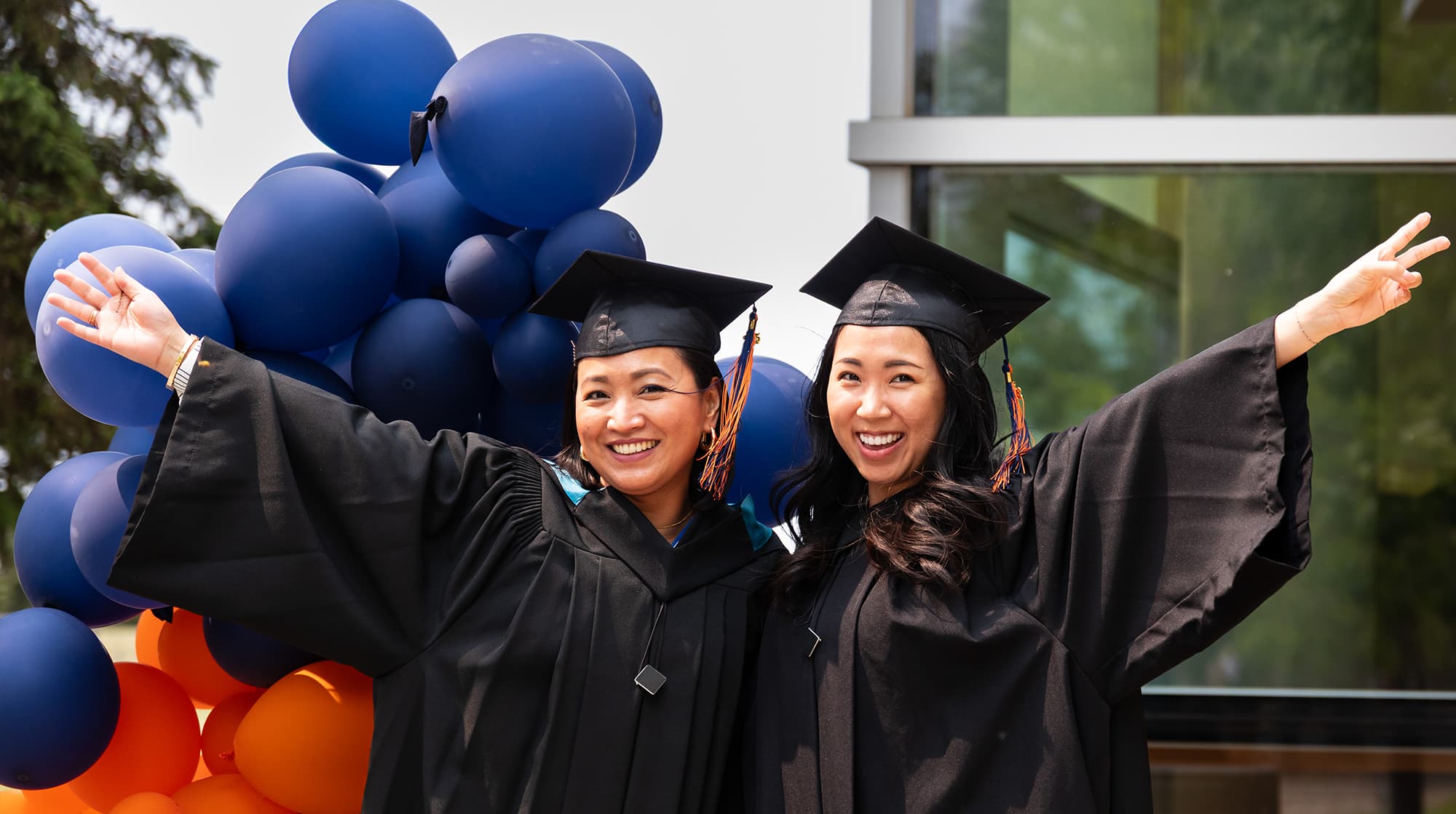 Alumni graduates celebrating